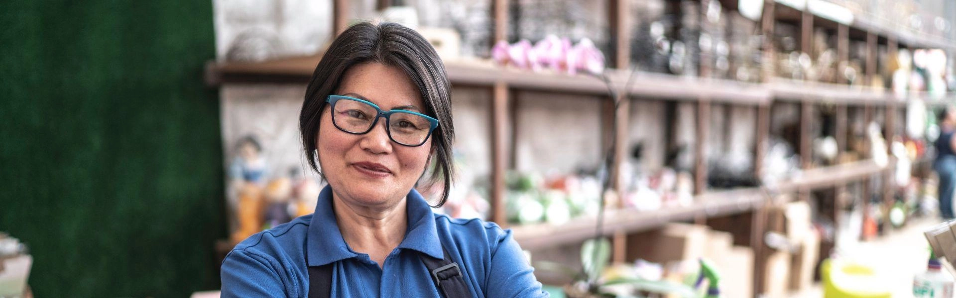 Mulher empreendedora dona de uma floricultura.